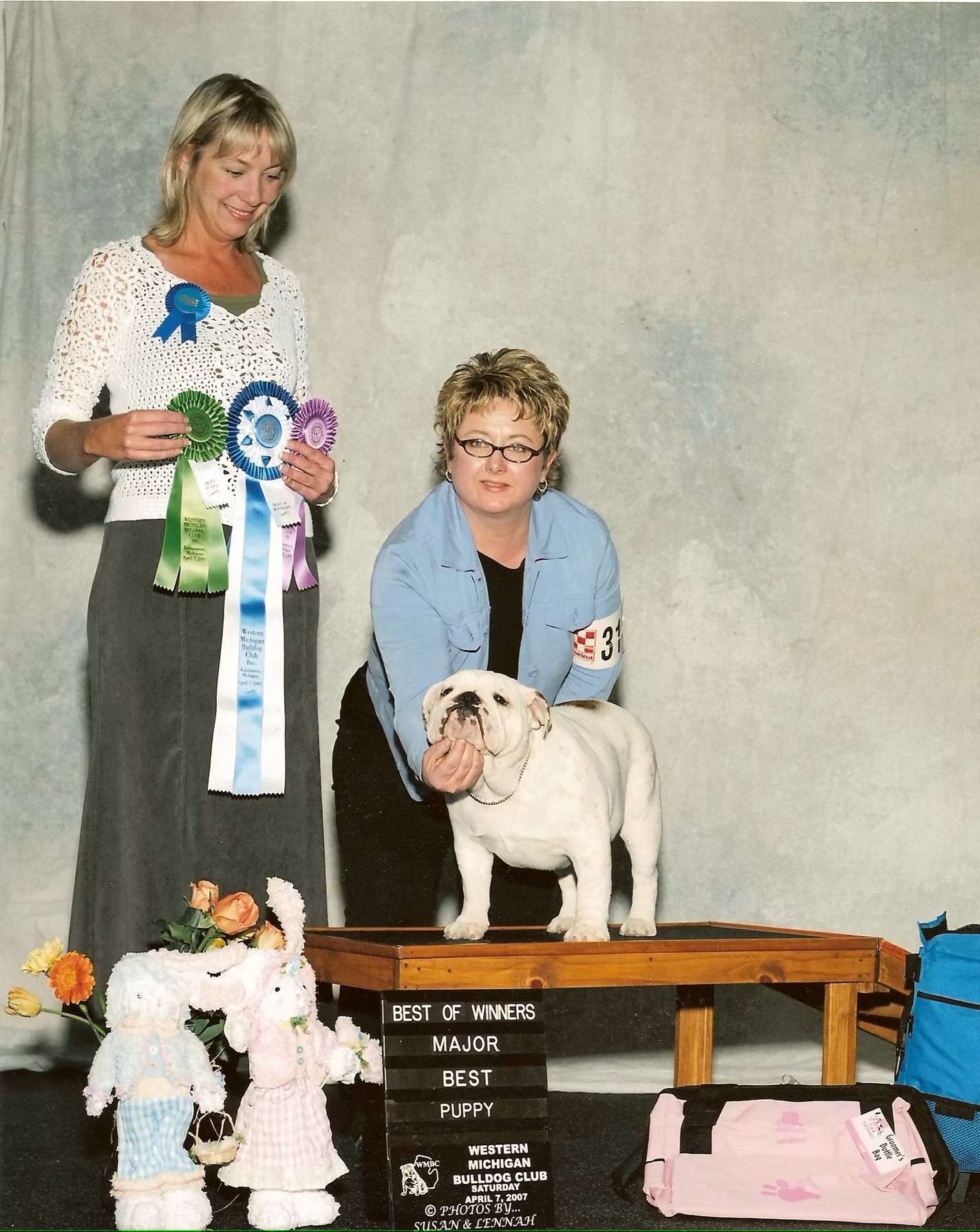 Bulldog With Show Judge and Owner