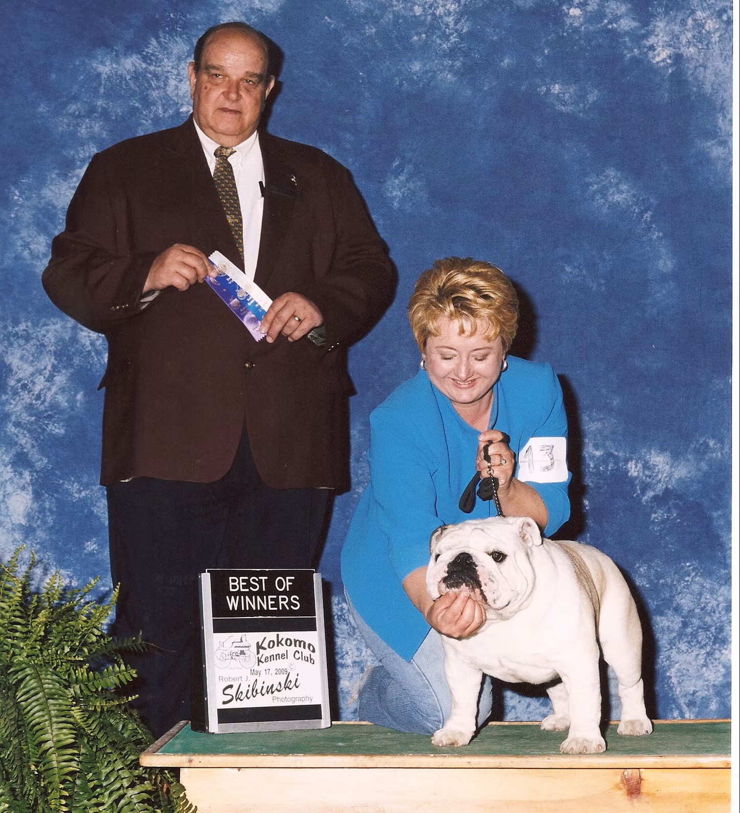 Bulldog With Show Judge and Owner