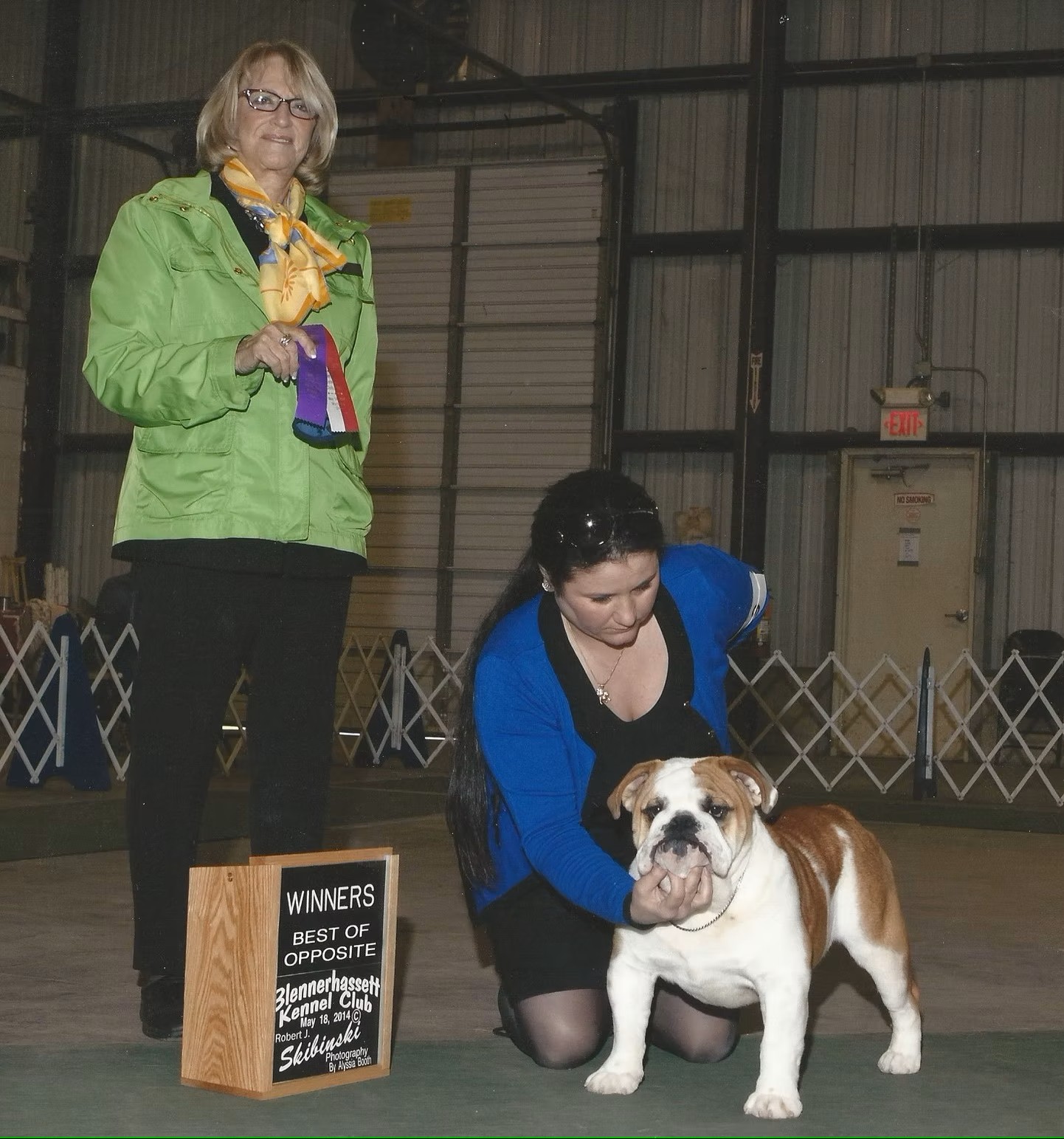 Bulldog With Show Judge and Owner