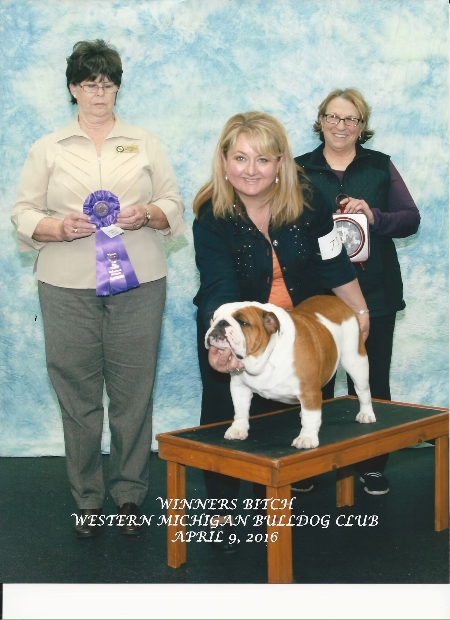 Bulldog With Show Judges and Owner
