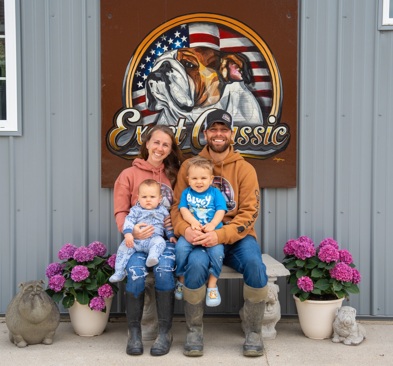 The owners of Exact Classic Bulldogs with their children